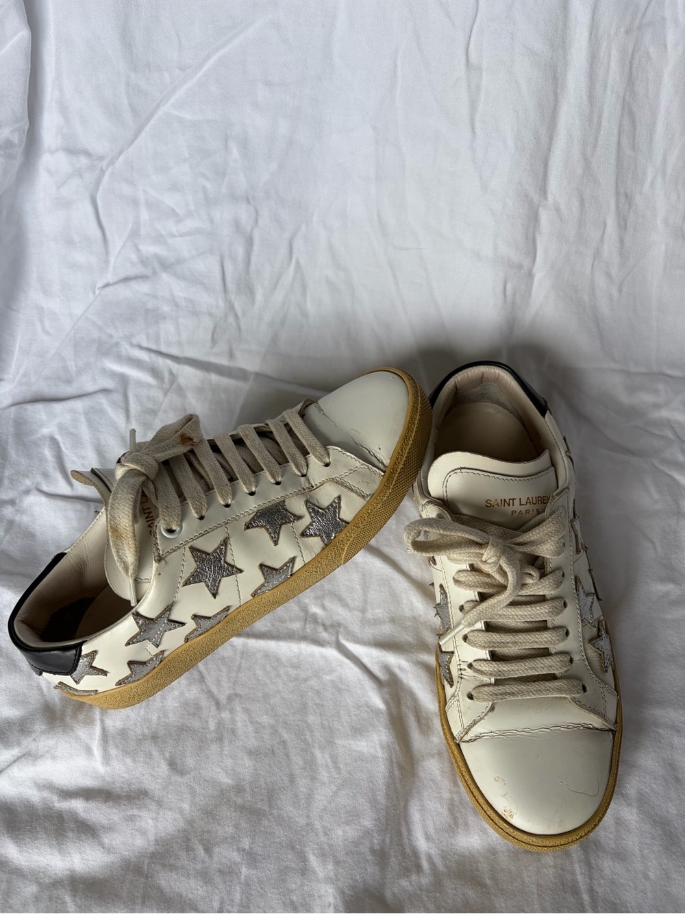 Saint Laurent Off-White Leather Sneakers with Silver Star Accents